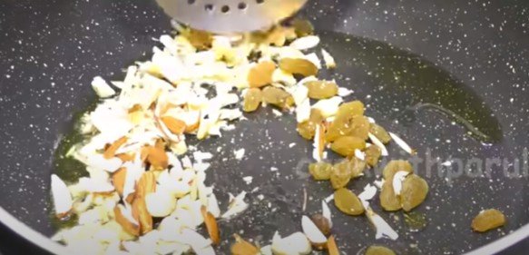 roasting dry fruits in a plan 