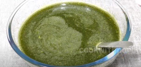 making tikha pani puri pani in a bowl