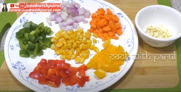 chopped vegetable in a plate for white sauce pasta recipe 