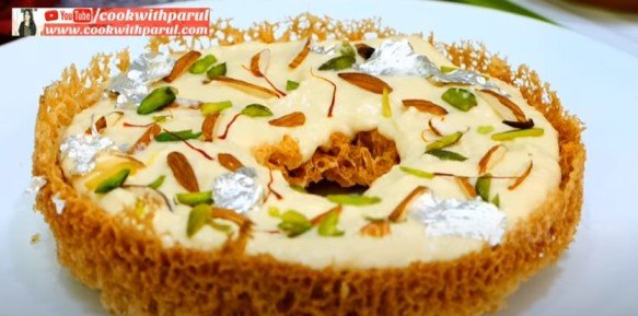 Ghewar cake 💛 It's an traditional fusion cake with authentic and richness  of 6 different dry fruits and 8 different spices including… | Instagram