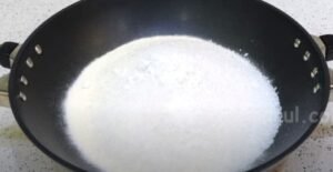 milk, baking soda, sugar and corn flour mix in a pan for condensed milk recipe 