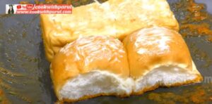 roasting pav on tawa for pav bhaji recipe 