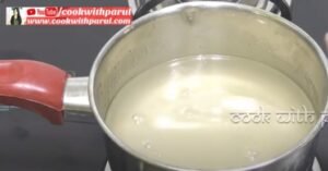 melting sugar to prepare sugar syrup for jalebi recipe 