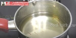 sugar syrup in a pan for jalebi recipe 