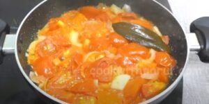 mushy tomato in a pan for tomato soup recipe 
